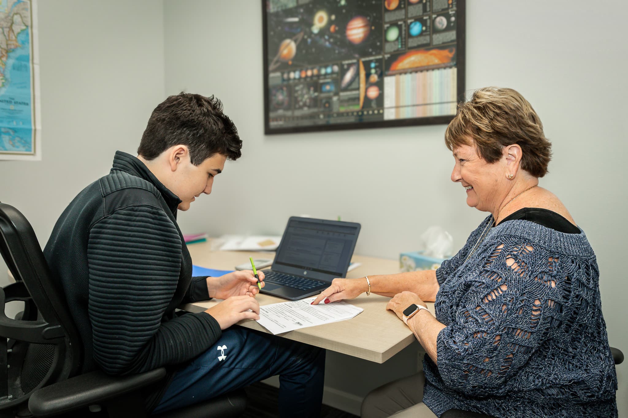 student and teacher during class
